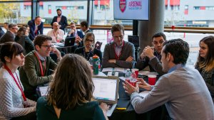 Business people in conference around a table