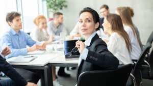 Team in an office having a meeting at a table