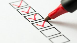 Checklist marked red with a red pen