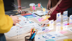 Close up ux developer and ui designer use augmented reality brainstorming about mobile app interface