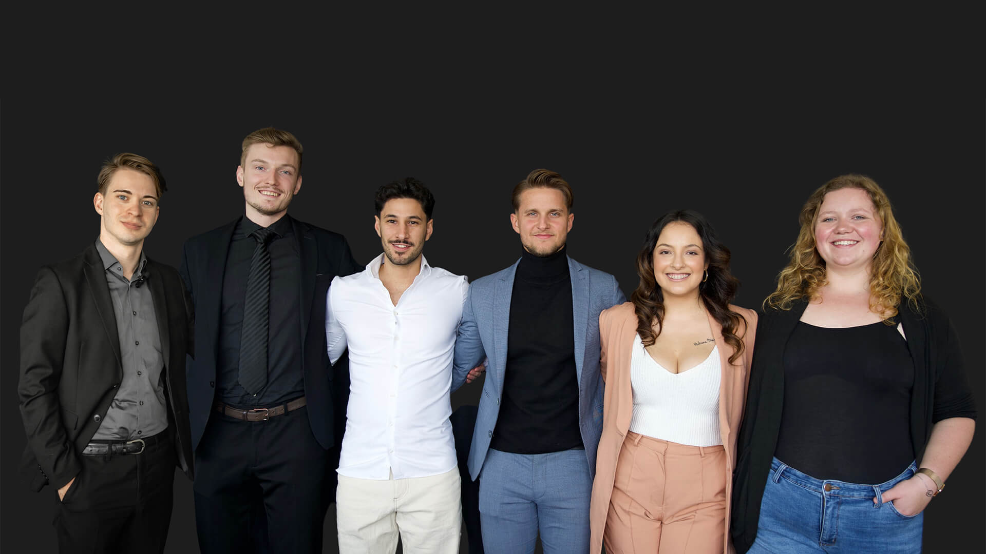 group photo of people posing and smiling