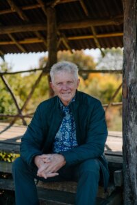 portrait of man of sitting and smiling