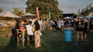 people standing at a green event